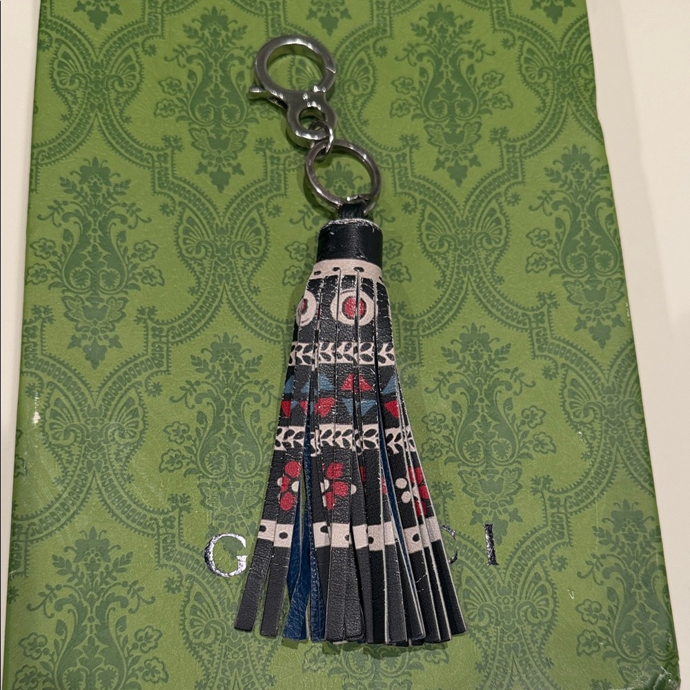 Brighton Black Tassel Keychain with Red and Cream Accents - Picture 2 of 7